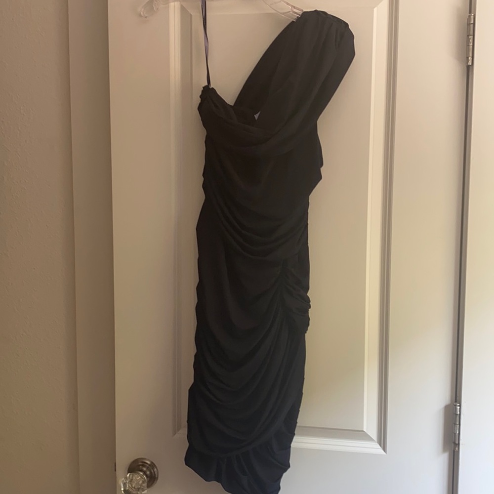 Very dark runs small Vera Wang lavender label